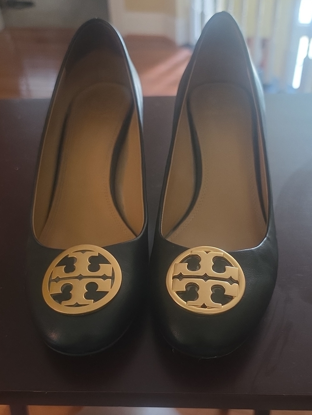 Black Leather Ballet Heels with Gold Emblem